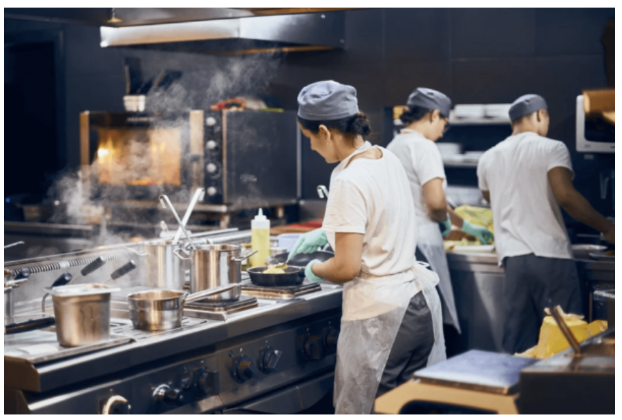 Chef preparing a gourmet dish in a kitchen